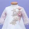 rochita botez ivoire cu roz pudra si aplicatie florala pe piept